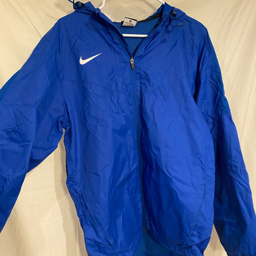 Blue Nike rain jacket